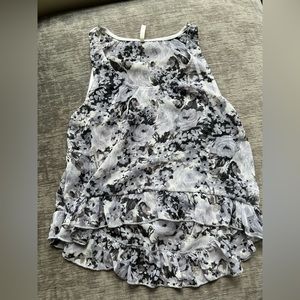 Sheer ruffle high low tank